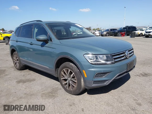 ✅ 2020 Volkswagen Tiguan SE • VIN: 3VV3B7AX1LM106200 • Lot: 44531293. Listed on IAAI with 52,007 mi. Free auction sales archive from the USA and detailed vehicle history report at DreamBid. Image 1.