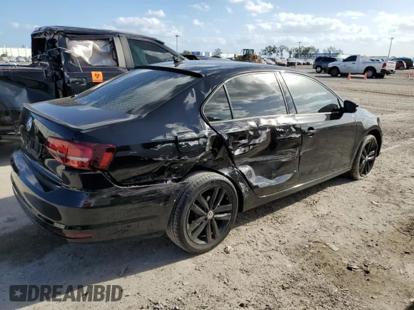✅ 2018 Volkswagen Jetta SE Sport • VIN: 3VWD17AJXJM229067 • Лот: 69918042. Опубліковано раніше на Copart з пробігом 58 979 миль. Безкоштовний доступ до архіву аукціонних продажів зі США та докладний звіт про історію автомобіля на DreamBid. Зображення 3.