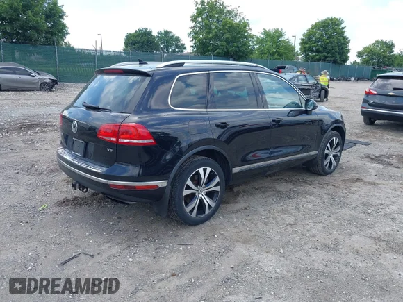 ✅ 2017 Volkswagen Touareg Wolfsburg Edition • VIN: WVGRF7BPXHD000869 • Лот: 45474558. Опубликован ранее на IAAI с пробегом 76 254 миль. Бесплатный доступ к архиву аукционных продаж из США и подробный отчёт об истории автомобиля на DreamBid. Изображение 4.