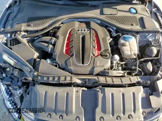 ✅ 2015 Audi RS 7 Prestige • VIN: WUAW2AFC7FN901067 • Лот: 84822874. Опубликован ранее на Copart с пробегом 85 329 миль. Бесплатный доступ к архиву аукционных продаж из США и подробный отчёт об истории автомобиля на DreamBid. Изображение 13.