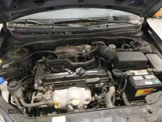 2010 Hyundai Accent SE z VIN KMHCN3AC5AU154590, wystawiony jako Copart lot #85150054 z przebiegiem 115 376 mil mil oraz Szkoda całkowita • Salvage title. Historia ofert i sprzedaży dostępna na DreamBid. Obrazek 12.