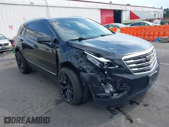 ✅ 2017 Cadillac XT5 Luxury FWD • VIN: 1GYKNBRS9HZ180994 • Лот: 42884226. Опубликован ранее на IAAI с пробегом 127 075 миль. Бесплатный доступ к архиву аукционных продаж из США и подробный отчёт об истории автомобиля на DreamBid. Изображение 1.
