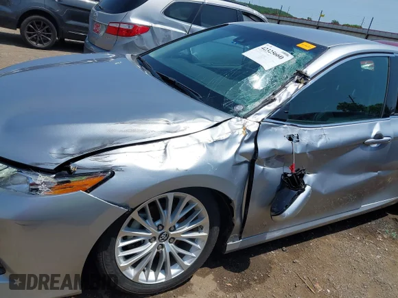 ✅ 2018 Toyota Camry SE • VIN: 4T1B11HKXJU157669 • Лот: 42325660. Опубликован ранее на IAAI с пробегом 125 721 миль. Бесплатный доступ к архиву аукционных продаж из США и подробный отчёт об истории автомобиля на DreamBid. Изображение 6.
