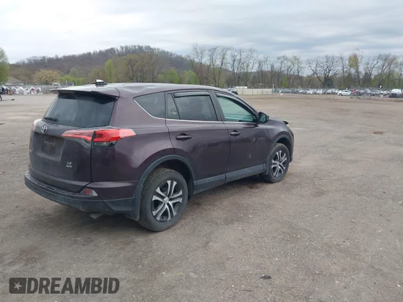 ✅ 2018 Toyota RAV4 LE • VIN: 2T3BFREV0JW754979 • Lot: 44838836. Listed on IAAI with 126,861 mi. Free auction sales archive from the USA and detailed vehicle history report at DreamBid. Image 4.