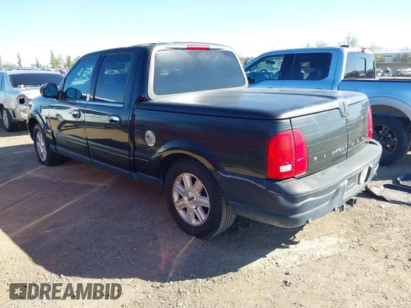 ✅ 2002 Lincoln Blackwood • VIN: 5LTEW05A62KJ02980 • Lot: 43458192. Listed on IAAI with Not provided. Free auction sales archive from the USA and detailed vehicle history report at DreamBid. Image 3.