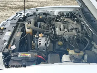 ✅ 2004 Ford Mustang Deluxe • VIN: 1FAFP44644F193077 • Lot: 42455984. Listed on IAAI with 138,265 mi. Free auction sales archive from the USA and detailed vehicle history report at DreamBid. Image 13.