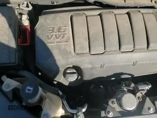 2017 Chevrolet Traverse LS z VIN 1GNKRFED5HJ135260, wystawiony jako Copart lot #82517615 z przebiegiem 105 387 mil mil oraz Szkoda całkowita • Salvage title. Historia ofert i sprzedaży dostępna na DreamBid. Obrazek 16.