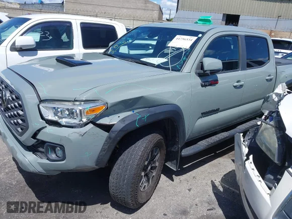 ✅ 2022 Toyota Tacoma TRD Sport • VIN: 3TMCZ5AN4NM509281 • Lot: 44756534. Wystawiony na IAAI z przebiegiem 25 304 mil. Bezpłatny archiwum sprzedaży aukcyjnych z USA i szczegółowy raport historii pojazdu na DreamBid. Zdjęcie 2.