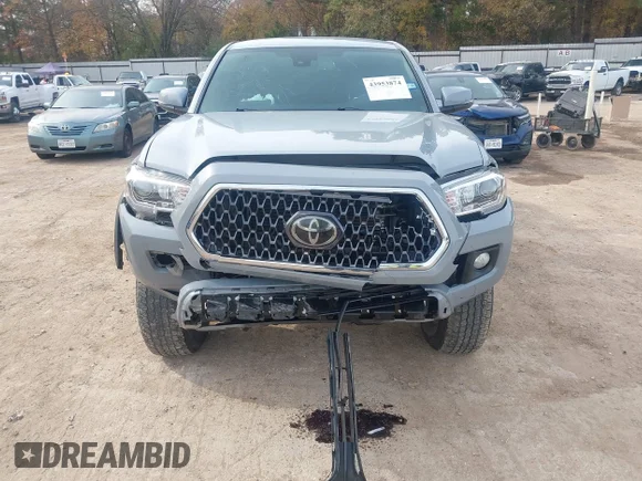 ✅ 2019 Toyota Tacoma TRD Off Road • VIN: 3TMCZ5AN4KM272612 • Lot: 43953874. Wystawiony na IAAI z przebiegiem 59 261 mil. Bezpłatny archiwum sprzedaży aukcyjnych z USA i szczegółowy raport historii pojazdu na DreamBid. Zdjęcie 6.