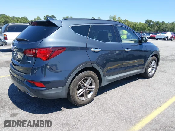 ✅ 2017 Hyundai Santa Fe 2.4L • VIN: 5NMZU3LBXHH045467 • Lot: 45310979. Listed on IAAI with 127,258 mi. Free auction sales archive from the USA and detailed vehicle history report at DreamBid. Image 4.
