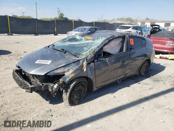 ✅ 2011 Honda Insight • VIN: JHMZE2H38BS010820 • Lot: 86636465. Listed on Copart with Not provided. Free auction sales archive from the USA and detailed vehicle history report at DreamBid. Image 1.