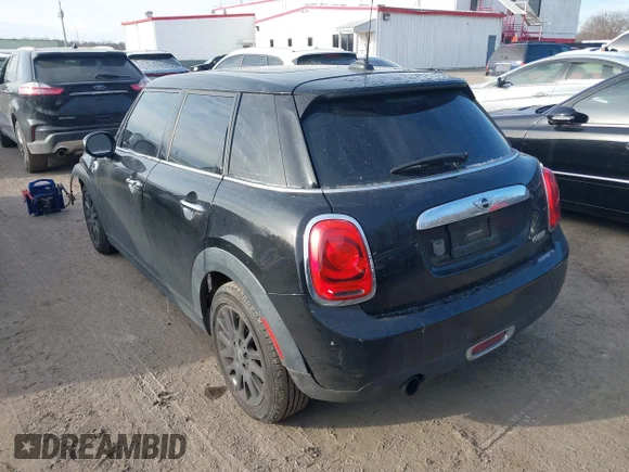 ✅ 2015 MINI Hardtop 4 Door • VIN: WMWXS5C59FT833412 • Lot: 41358010. Wystawiony na IAAI z przebiegiem 100 248 mil. Bezpłatny archiwum sprzedaży aukcyjnych z USA i szczegółowy raport historii pojazdu na DreamBid. Zdjęcie 3.