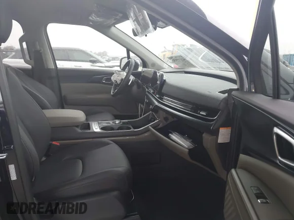 ✅ 2025 Kia Carnival LXS • VIN: KNDNB5KA6S6044796 • Лот: 41199932. Опубліковано раніше на IAAI з пробігом 599 миль. Безкоштовний доступ до архіву аукціонних продажів зі США та докладний звіт про історію автомобіля на DreamBid. Зображення 5.