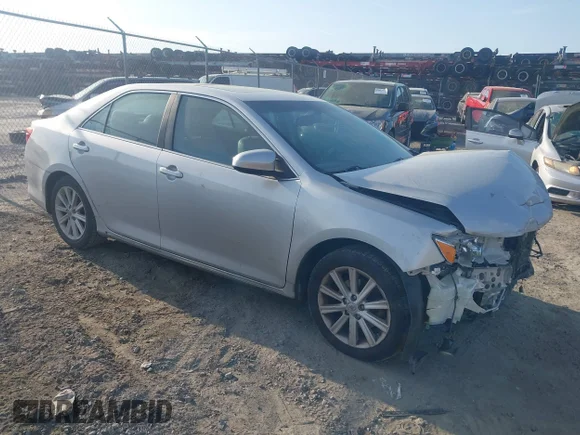 ✅ 2014 Toyota Camry XLE • VIN: 4T1BK1FK2EU027486 • Lot: 44582305. Listed on IAAI with 187,000 mi. Free auction sales archive from the USA and detailed vehicle history report at DreamBid. Image 1.