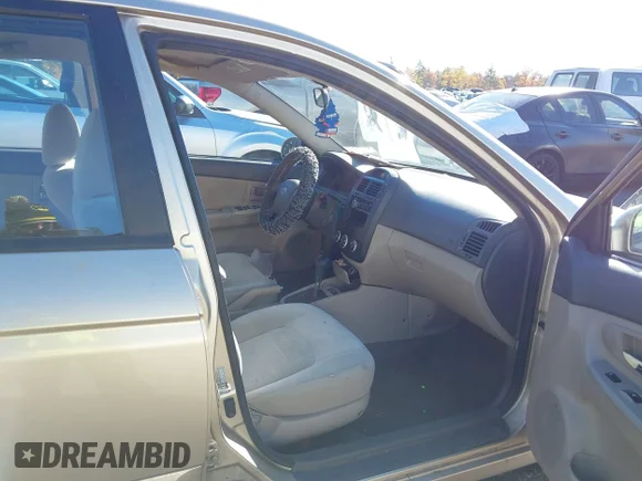 ✅ 2009 Kia Spectra EX • VIN: KNAFE222695664578 • Лот: 43495411. Опубліковано раніше на IAAI з пробігом 164 496 миль. Безкоштовний доступ до архіву аукціонних продажів зі США та докладний звіт про історію автомобіля на DreamBid. Зображення 5.
