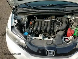 ✅ 2017 Honda Fit LX • VIN: JHMGK5H54HS001057 • Lot: 60439545. Listed on Copart with 64,887 mi. Free auction sales archive from the USA and detailed vehicle history report at DreamBid. Image 14.