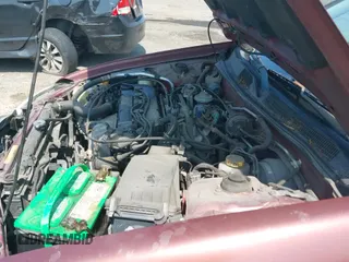 ✅ 2001 Nissan Altima GLE • VIN: 1N4DL01A21C124146 • Lot: 43014267. Listed on IAAI with 104,264 mi. Free auction sales archive from the USA and detailed vehicle history report at DreamBid. Image 13.