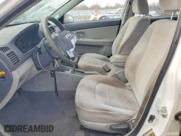 ✅ 2009 Kia Spectra EX • VIN: KNAFE222X95596270 • Лот: 97868845. Опубліковано раніше на Copart з пробігом 173 548 миль. Безкоштовний доступ до архіву аукціонних продажів зі США та докладний звіт про історію автомобіля на DreamBid. Зображення 7.