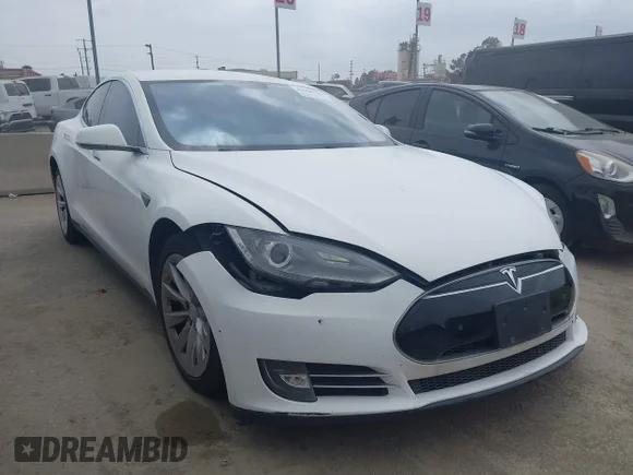 ✅ 2014 Tesla Model S 60 • VIN: 5YJSA1H16EFP32585 • Lot: 42068925. Listed on IAAI with 119,561 mi. Free auction sales archive from the USA and detailed vehicle history report at DreamBid. Image 1.