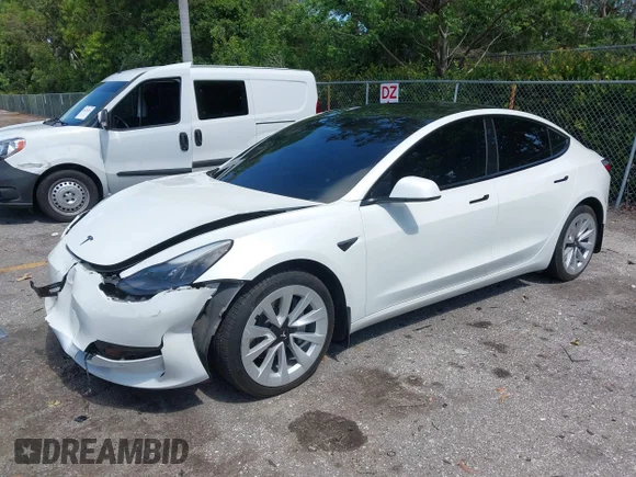 ✅ 2022 Tesla Model 3 Long Range • VIN: 5YJ3E1EB8NF255177 • Лот: 45437885. Опубликован ранее на IAAI с пробегом 62 520 миль. Бесплатный доступ к архиву аукционных продаж из США и подробный отчёт об истории автомобиля на DreamBid. Изображение 2.