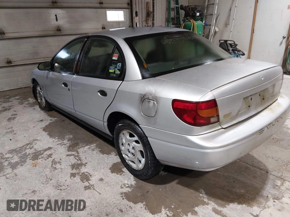 ✅ 2002 Saturn SL • VIN: 1G8ZG52832Z140121 • Lot: 44773299. Wystawiony na IAAI z przebiegiem 208 499 mil. Bezpłatny archiwum sprzedaży aukcyjnych z USA i szczegółowy raport historii pojazdu na DreamBid. Zdjęcie 3.