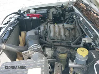 ✅ 2002 Isuzu Rodeo S • VIN: 4S2CK58W024313661 • Lot: 42305564. Listed on IAAI with 174,949 mi. Free auction sales archive from the USA and detailed vehicle history report at DreamBid. Image 12.