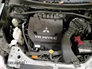 ✅ 2010 Mitsubishi Outlander LS • VIN: JA4JT3AX4AZ601735 • Lot: 83313844. Wystawiony na Copart z przebiegiem 96 444 mil. Bezpłatny archiwum sprzedaży aukcyjnych z USA i szczegółowy raport historii pojazdu na DreamBid. Zdjęcie 16.