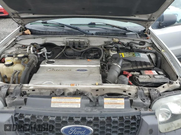 ✅ 2005 Ford Escape Hybrid • VIN: 1FMCU95H75KC07240 • Лот: 52515925. Опубліковано раніше на Copart з пробігом 217 237 миль. Безкоштовний доступ до архіву аукціонних продажів зі США та докладний звіт про історію автомобіля на DreamBid. Зображення 12.