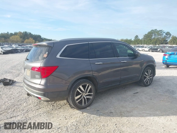 ✅ 2016 Honda Pilot Touring • VIN: 5FNYF6H92GB064656 • Lot: 44619441. Wystawiony na IAAI z przebiegiem 163 353 mil. Bezpłatny archiwum sprzedaży aukcyjnych z USA i szczegółowy raport historii pojazdu na DreamBid. Zdjęcie 4.