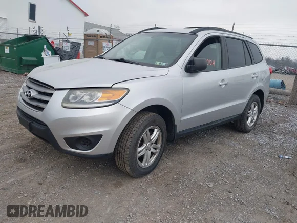 ✅ 2012 Hyundai Santa Fe GLS • VIN: 5XYZGDAB9CG121036 • Lot: 44130124. Wystawiony na IAAI z przebiegiem 174 910 mil. Bezpłatny archiwum sprzedaży aukcyjnych z USA i szczegółowy raport historii pojazdu na DreamBid. Zdjęcie 2.