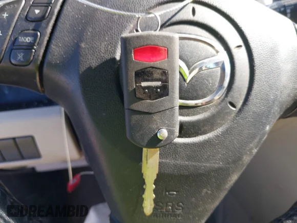 ✅ 2010 Mazda 5 Sport • VIN: JM1CR2W36A0388210 • Лот: 43087229. Опубликован ранее на IAAI с пробегом 189 673 миль. Бесплатный доступ к архиву аукционных продаж из США и подробный отчёт об истории автомобиля на DreamBid. Изображение 11.