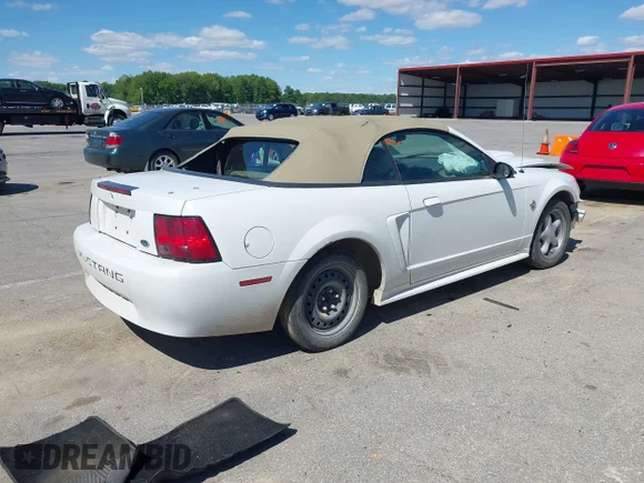 ✅ 2004 Ford Mustang Deluxe • VIN: 1FAFP44654F232985 • Lot: 45124536. Listed on IAAI with 165,988 mi. Free auction sales archive from the USA and detailed vehicle history report at DreamBid. Image 4.