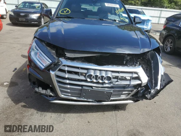 ✅ 2018 Audi Q5 Premium • VIN: WA1ANAFY4J2051588 • Лот: 58406592. Опубліковано раніше на Copart з пробігом 57 390 миль. Безкоштовний доступ до архіву аукціонних продажів зі США та докладний звіт про історію автомобіля на DreamBid. Зображення 9.