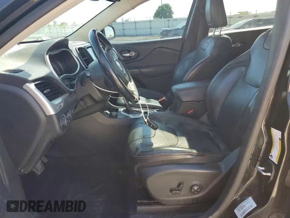 ✅ 2015 Jeep Cherokee Trailhawk • VIN: 1C4PJMBS1FW779223 • Lot: 57222526. Listed on Copart with 238,095 mi. Free auction sales archive from the USA and detailed vehicle history report at DreamBid. Image 7.