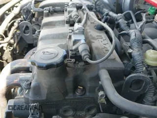 ✅ 2003 Mazda Protege • VIN: JM1BJ245731221133 • Lot: 42398641. Wystawiony na IAAI z przebiegiem 218 108 mil. Bezpłatny archiwum sprzedaży aukcyjnych z USA i szczegółowy raport historii pojazdu na DreamBid. Zdjęcie 13.