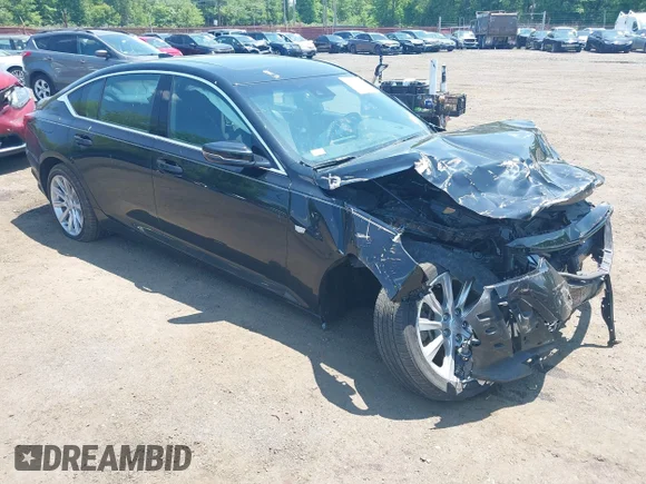 ✅ 2022 Cadillac CT5 Luxury • VIN: 1G6DX5RK0N0130725 • Lot: 42400071. Listed on IAAI with 33,148 mi. Free auction sales archive from the USA and detailed vehicle history report at DreamBid. Image 1.