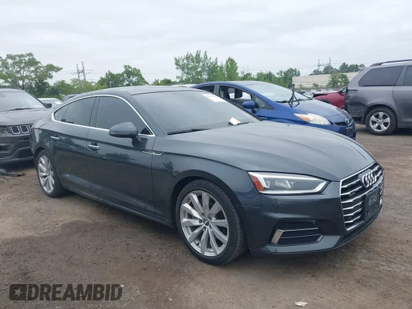 ✅ 2018 Audi A5 Sportback Premium Plus • VIN: WAUBNCF53JA087237 • Лот: 42559089. Опубликован ранее на IAAI с пробегом 71 567 миль. Бесплатный доступ к архиву аукционных продаж из США и подробный отчёт об истории автомобиля на DreamBid. Изображение 1.