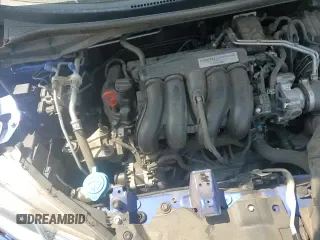 ✅ 2018 Honda Fit LX • VIN: 3HGGK5H40JM725014 • Лот: 71549475. Опубликован ранее на Copart с пробегом 105 079 миль. Бесплатный доступ к архиву аукционных продаж из США и подробный отчёт об истории автомобиля на DreamBid. Изображение 15.