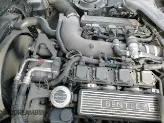 ✅ 1996 Bentley Brooklands • VIN: SCBZE11C4TCX57237 • Лот: 86629574. Опубликован ранее на Copart с пробегом 155 582 миль. Бесплатный доступ к архиву аукционных продаж из США и подробный отчёт об истории автомобиля на DreamBid. Изображение 12.