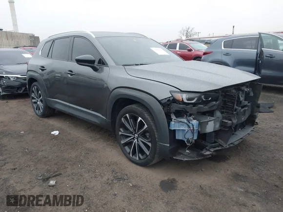 ✅ 2023 Mazda CX-50 Premium • VIN: 7MMVABDY3PN138305 • Lot: 43803633. Listed on IAAI with 28,438 mi. Free auction sales archive from the USA and detailed vehicle history report at DreamBid. Image 1.