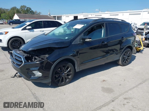 ✅ 2017 Ford Escape Titanium • VIN: 1FMCU0J90HUA20506 • Lot: 44389106. Wystawiony na IAAI z przebiegiem 90 915 mil. Bezpłatny archiwum sprzedaży aukcyjnych z USA i szczegółowy raport historii pojazdu na DreamBid. Zdjęcie 2.