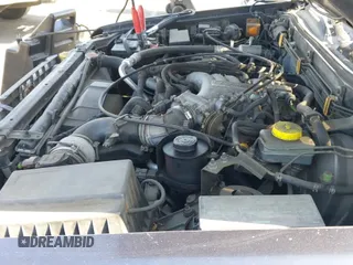 ✅ 1998 Infiniti QX4 • VIN: JNRAR05Y9WW021489 • Lot: 43032723. Wystawiony na IAAI z przebiegiem 142 697 mil. Bezpłatny archiwum sprzedaży aukcyjnych z USA i szczegółowy raport historii pojazdu na DreamBid. Zdjęcie 13.