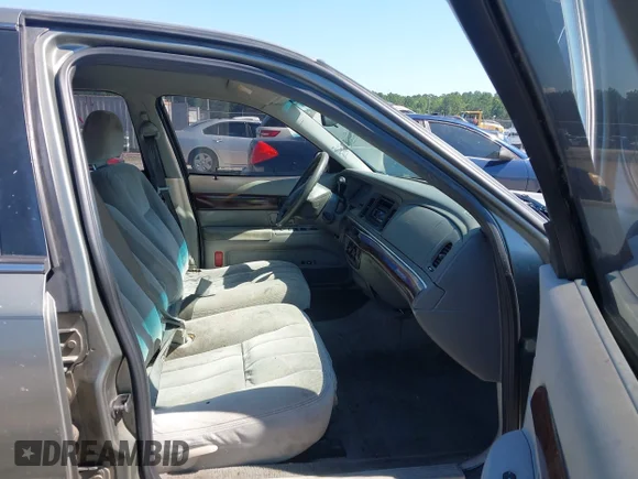 ✅ 2003 Mercury Grand Marquis GS Convenience • VIN: 2MEFM74W23X624103 • Lot: 45443945. Wystawiony na IAAI z przebiegiem 263 689 mil. Bezpłatny archiwum sprzedaży aukcyjnych z USA i szczegółowy raport historii pojazdu na DreamBid. Zdjęcie 5.
