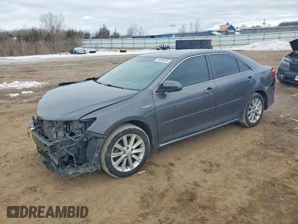 ✅ 2014 Toyota Camry XLE • VIN: 4T1BD1FK7EU103570 • Lot: 76596535. Listed on Copart with 216,182 mi. Free auction sales archive from the USA and detailed vehicle history report at DreamBid. Image 1.