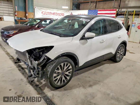 ✅ 2021 Ford Escape Titanium • VIN: 1FMCU9J94MUA57671 • Лот: 76178295. Опубликован ранее на Copart с пробегом 73 146 миль. Бесплатный доступ к архиву аукционных продаж из США и подробный отчёт об истории автомобиля на DreamBid. Изображение 1.