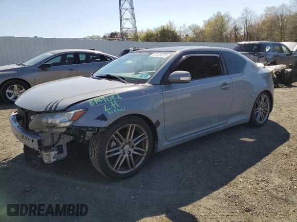 ✅ 2012 Scion tC • VIN: JTKJF5C71C3029365 • Lot: 53423875. Wystawiony na Copart z przebiegiem 121 943 mil. Bezpłatny archiwum sprzedaży aukcyjnych z USA i szczegółowy raport historii pojazdu na DreamBid. Zdjęcie 1.