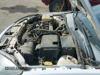 ✅ 2004 Ford Focus LX • VIN: 1FAFP33Z24W176963 • Lot: 42127710. Wystawiony na IAAI z przebiegiem 389 589 mil. Bezpłatny archiwum sprzedaży aukcyjnych z USA i szczegółowy raport historii pojazdu na DreamBid. Zdjęcie 12.