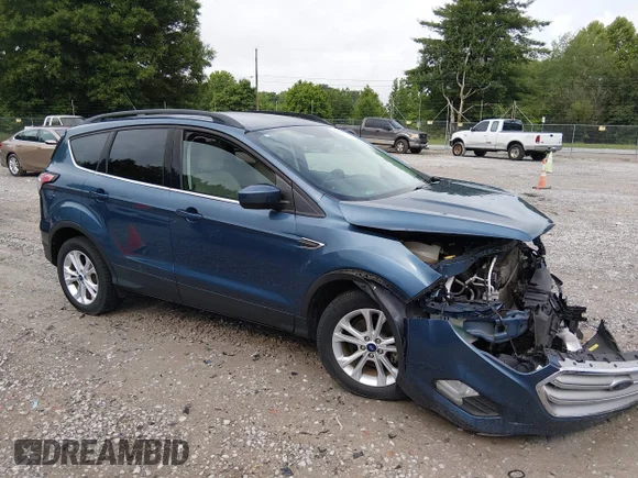 ✅ 2018 Ford Escape SE • VIN: 1FMCU0GD4JUC16711 • Lot: 45189865. Listed on IAAI with 125,494 mi. Free auction sales archive from the USA and detailed vehicle history report at DreamBid. Image 1.
