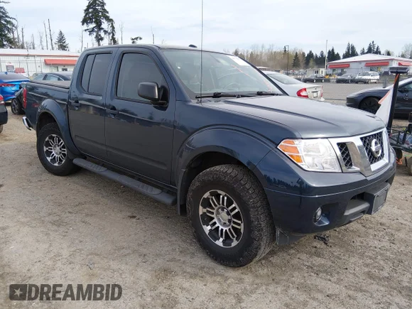 ✅ 2016 Nissan Frontier Pro-4X • VIN: 1N6AD0EV2GN753990 • Lot: 44770053. Listed on IAAI with 99,366 mi. Free auction sales archive from the USA and detailed vehicle history report at DreamBid. Image 1.