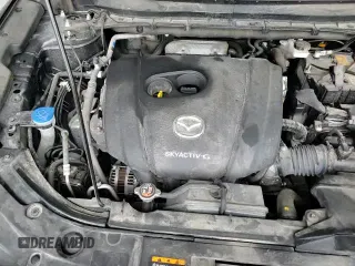 ✅ 2023 Mazda CX-5 S Premium • VIN: JM3KFBDM7P0178389 • Лот: 80850935. Опубликован ранее на Copart с пробегом 58 949 миль. Бесплатный доступ к архиву аукционных продаж из США и подробный отчёт об истории автомобиля на DreamBid. Изображение 14.